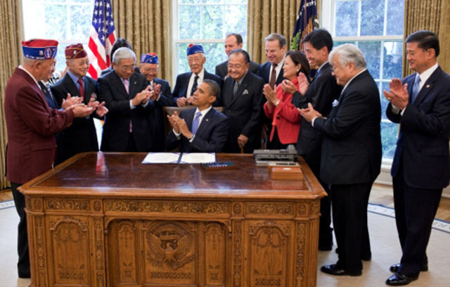 In 2011, surviving Japanese-American Veterans were recognized with the Congressional Gold Medal, pictured here with President Obama during the signing ceremony.
