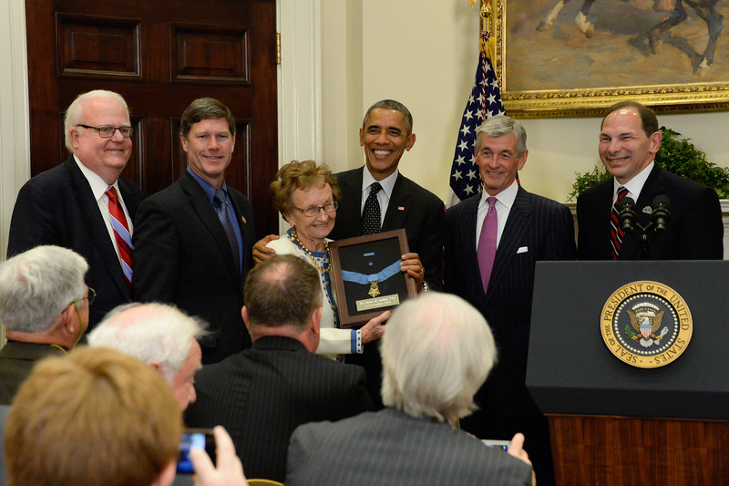 President Barack Obama presents the Medal of Honor to Helen Loring Ensign, a descendant of U.S. Army 1st Lt. Alonzo H. Cushing, during a ceremony at the White House in Washington, D.C., Nov. 6, 2014. Cushing was posthumously awarded the Medal of Honor for his actions during the Battle of Gettysburg on July 3, 1863. (U.S. Army photo By Staff Sgt. Laura Buchta/Released)