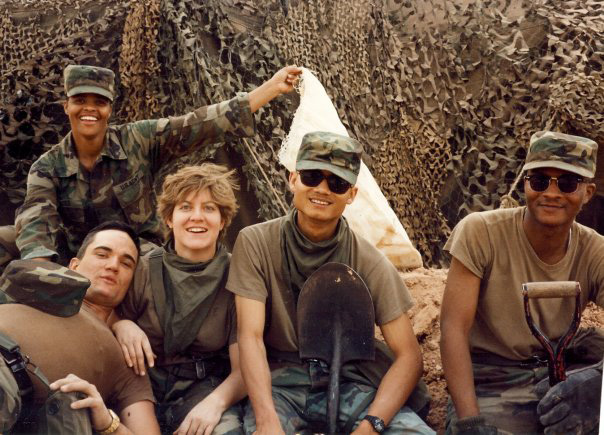 Image of a mid 90ies squad of soldiers relaxing.