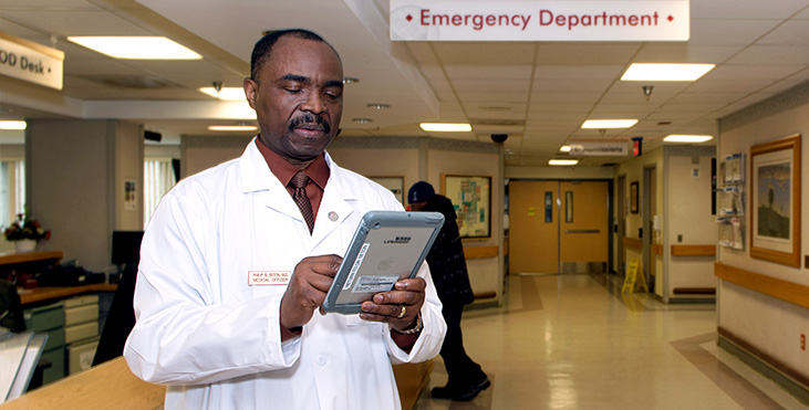 Doctor on tablet.
