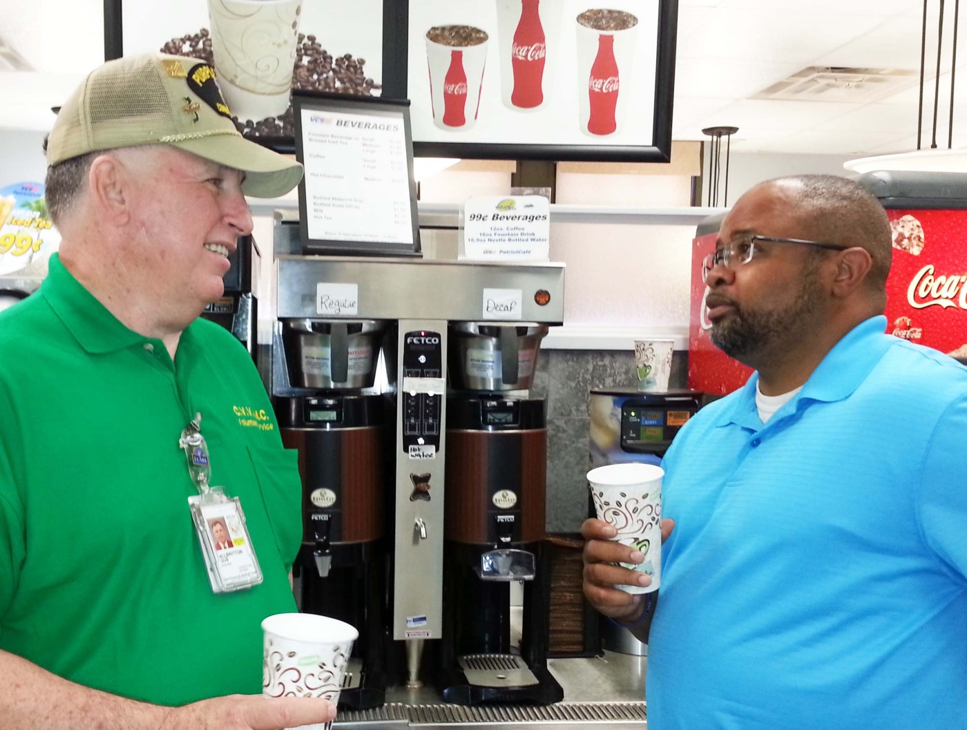Image of two Veterans drinking coffee.