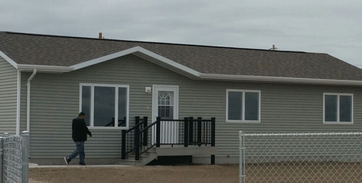 Image of A Veteran with the Oglala Sioux Tribe of Pine Ridge Reservation is among the first to move with his family into this permanent home, thanks to Tribal HUD-VASH.