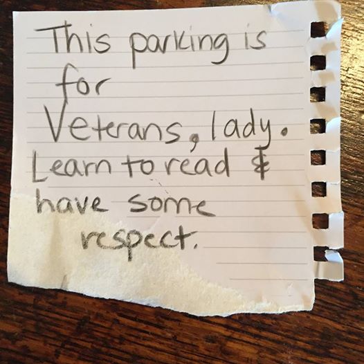 Image of a note reading "This is for Veterans, lady. Learn to read & have some respect.