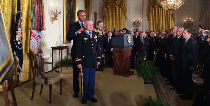 Image of Charles Kettles receiving the medal of honor