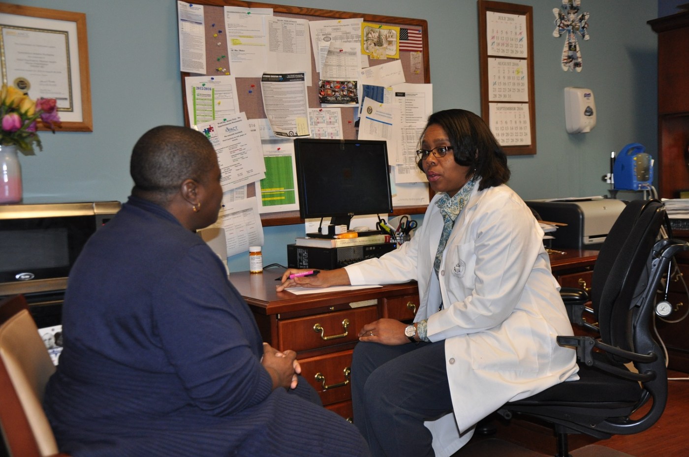 Gwen Adams-McAlpine, nurse practitioner at the Jackson VA in Mississippi, discusses a Hepatitis C treatment plan with a patient.