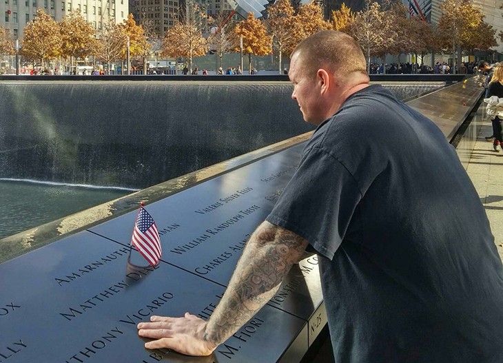 Image of Tim Wynn at the 9/11 Memorial in New York City.