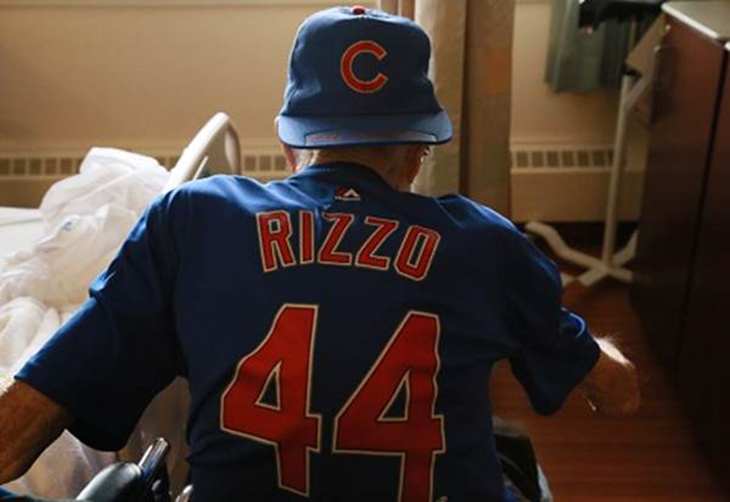 Robert Perkins show's off his Chicago Cubs Rizzo jersey