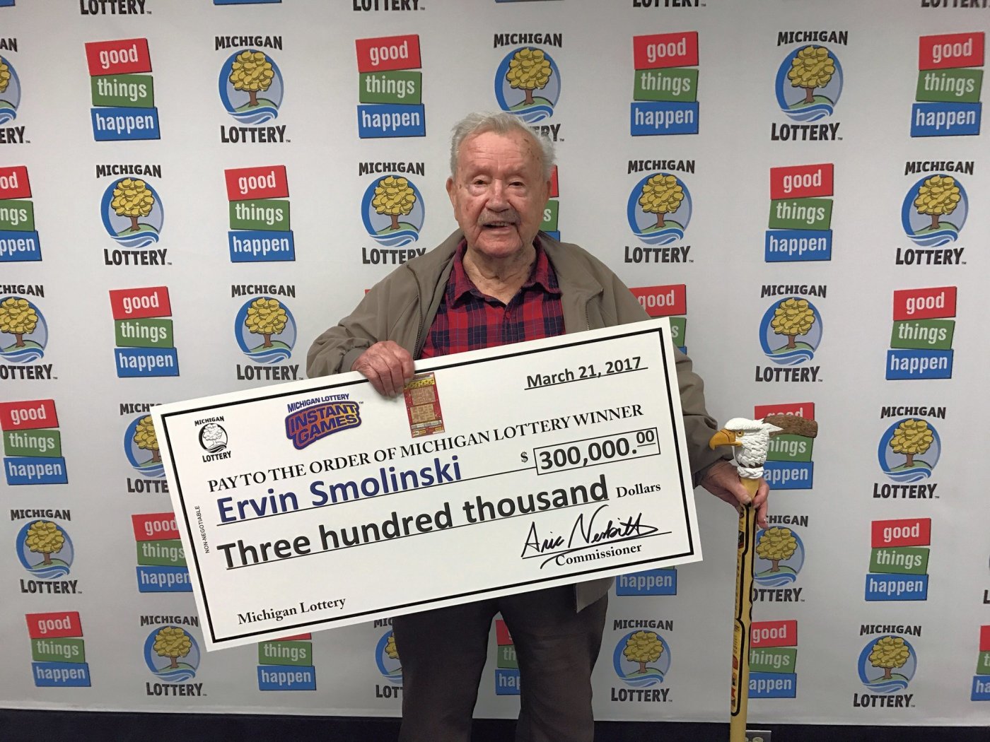 Ervin Smolinski smiles after collecting his $300,000 prize.