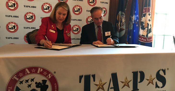 Image: Bonnie Carroll, Founder and President of TAPS, and VA Secretray David Shulkin, sign a Memorandum of Agreement April 12 at the Army and Navy Club in Washington. The MOA formalizes the organizations’ long-standing information working relationship to support surviving family members as they identify and secure the benefits available to them through the military service of their loved one.