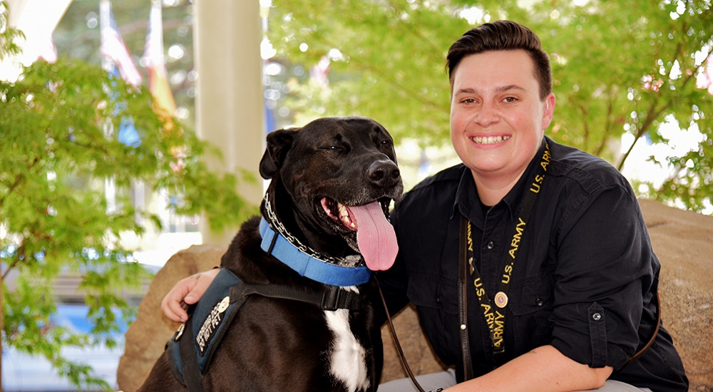 Veteran Alexandrea Gries and her service dog Sherman