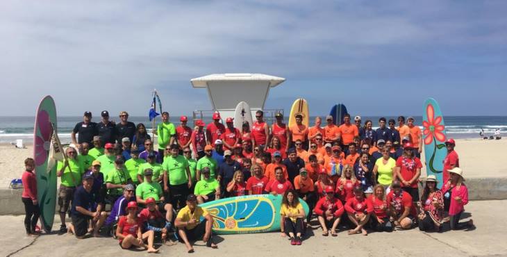 IMAGE: A group photo of the Veterans participating in the surfing event.