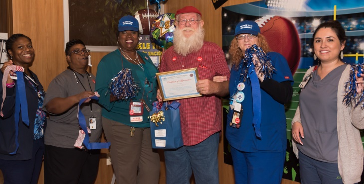 Image: VA North Texas Veteran patient, Jim Boltin, was the recipient of the 10,000th flu vaccine during October's Influenza Awareness Month.