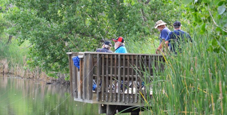 IMAGE: Arsenal Anglers volunteers and veterans immerse themselves in the refuge’s calming natural surroundings.