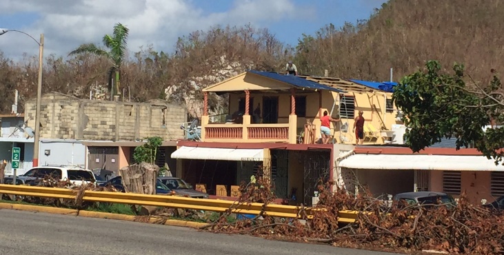Image: a building damaged by Hurrican Maria