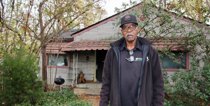IMAGE: . VA North Texas Veteran and Dallas resident, Arthur Shelton, stands in front of his home under repair.