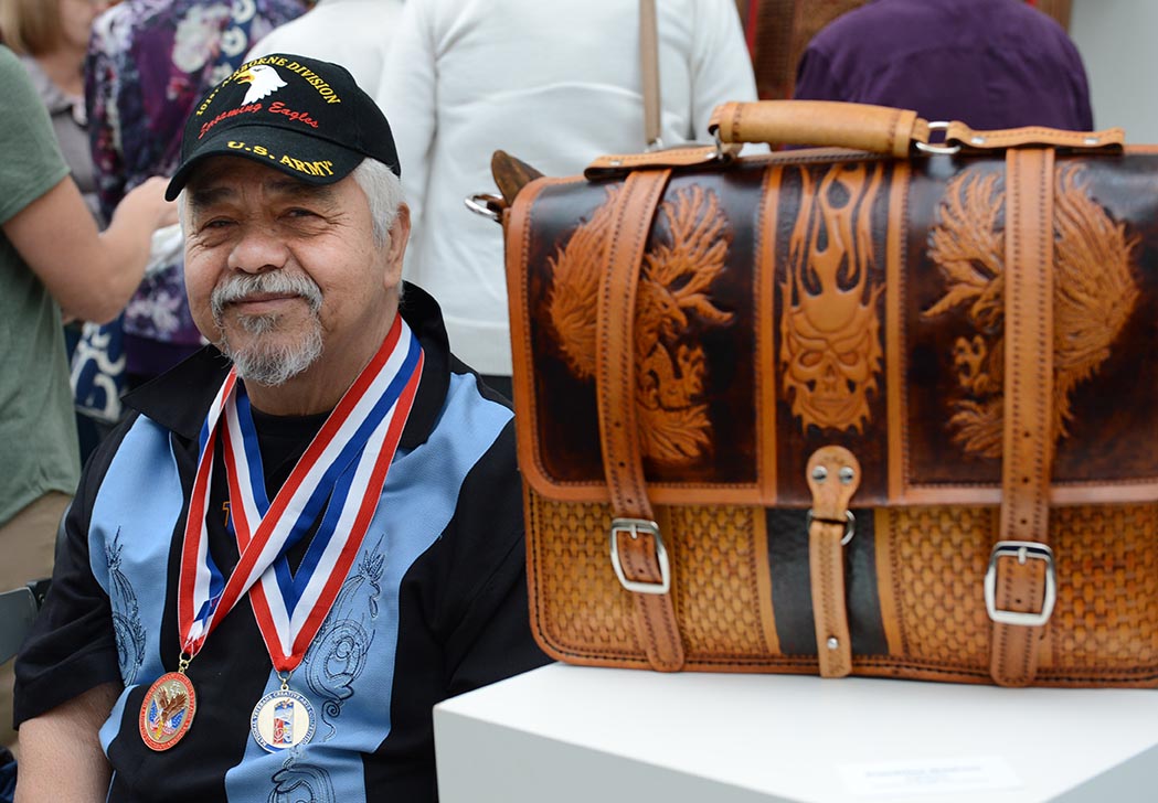 Veteran with leather artwork