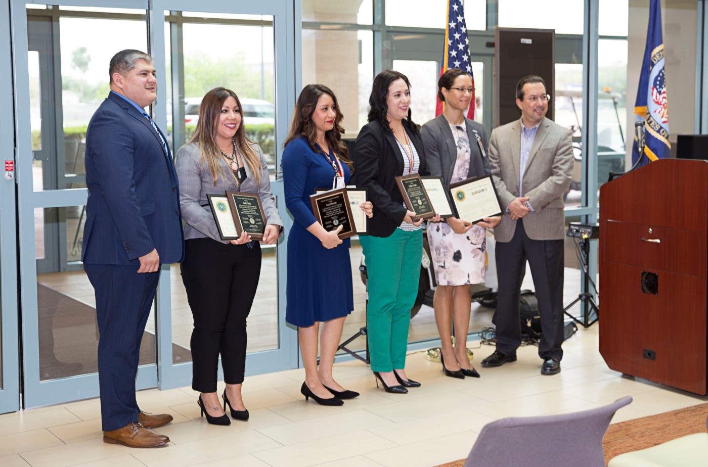 (At center) VA social workers Alondra Muñiz, Maribel Barcenas, Cynthia Gonzalez and VA psychologist Dr. Yasisca Pujols, pose for a group photo with Cameron County judge Eddie Treviño Jr. and Salvador J. Castillo, Cameron County Veterans service officer during a special awards ceremony held March 13, 2018, at the VA Health Care Center at Harlingen, Texas. The four Texas Valley Coastal Bend Health Care System employees were recognized by Cameron County officials for their outstanding work with Veterans.