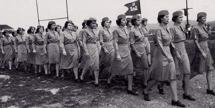 Photograph of soldiers in the Women's Army Corps marching in formation.