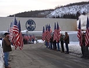 IMAGE: Patriot Guard Riders escorted three flatbed tractor-trailers hauling the 5th Marines Vietnam War Memorial from Rock of Ages, Barre, VT to Marine Camp Pendleton, CA on Thursday, March 22. (credit: Rock of Ages)