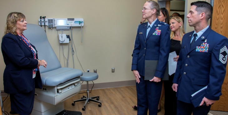 IMAGE: Gulf Coast Veterans Health Care System Nurse Manager Hope Summers explains a new primary care exam room setup to Air Force Colonel Pamela Smith, Eglin Air Force Base’s 96th Medical Group commander (middle), Air Force Chief Master Sgt. Scott Super, Eglin Air Force Base’s 96th Medical Group acting superintendent and others during a tour of the Eglin AFB VA clinic expansion ribbon cutting ceremony April 26.