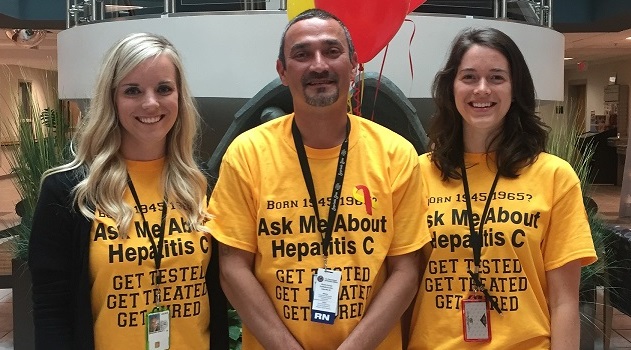 Taylor Browning, PSA, Michael Sidorovic, RN, and Erica Asaro, PharmD of the Asheville VAMC help raise awareness for hepatitis C.