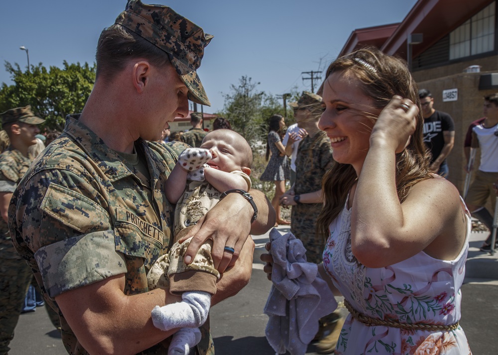 Marine Holding Newborn Son