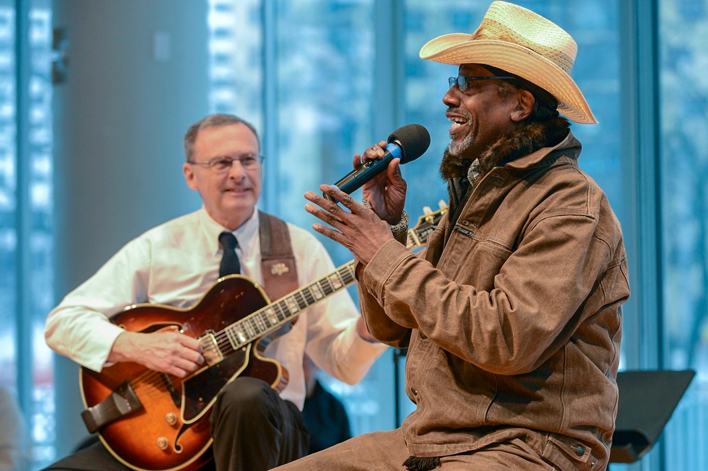 A Veteran sings during a Creative Arts concert