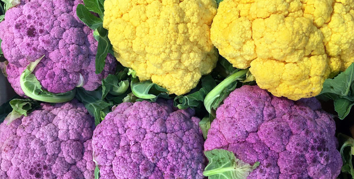 Photo shows yellow and purple cauliflower
