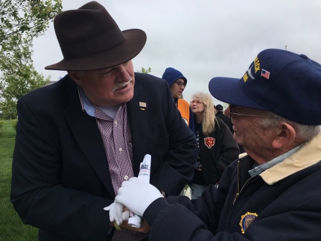 USMA Reeves shakes hands with a Veteran