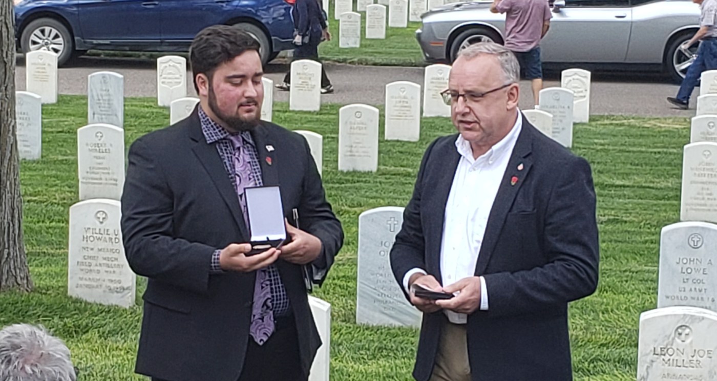 A fallen WWII soldier's nephew receiving his dog tags at Santa Fe National Cemetery.