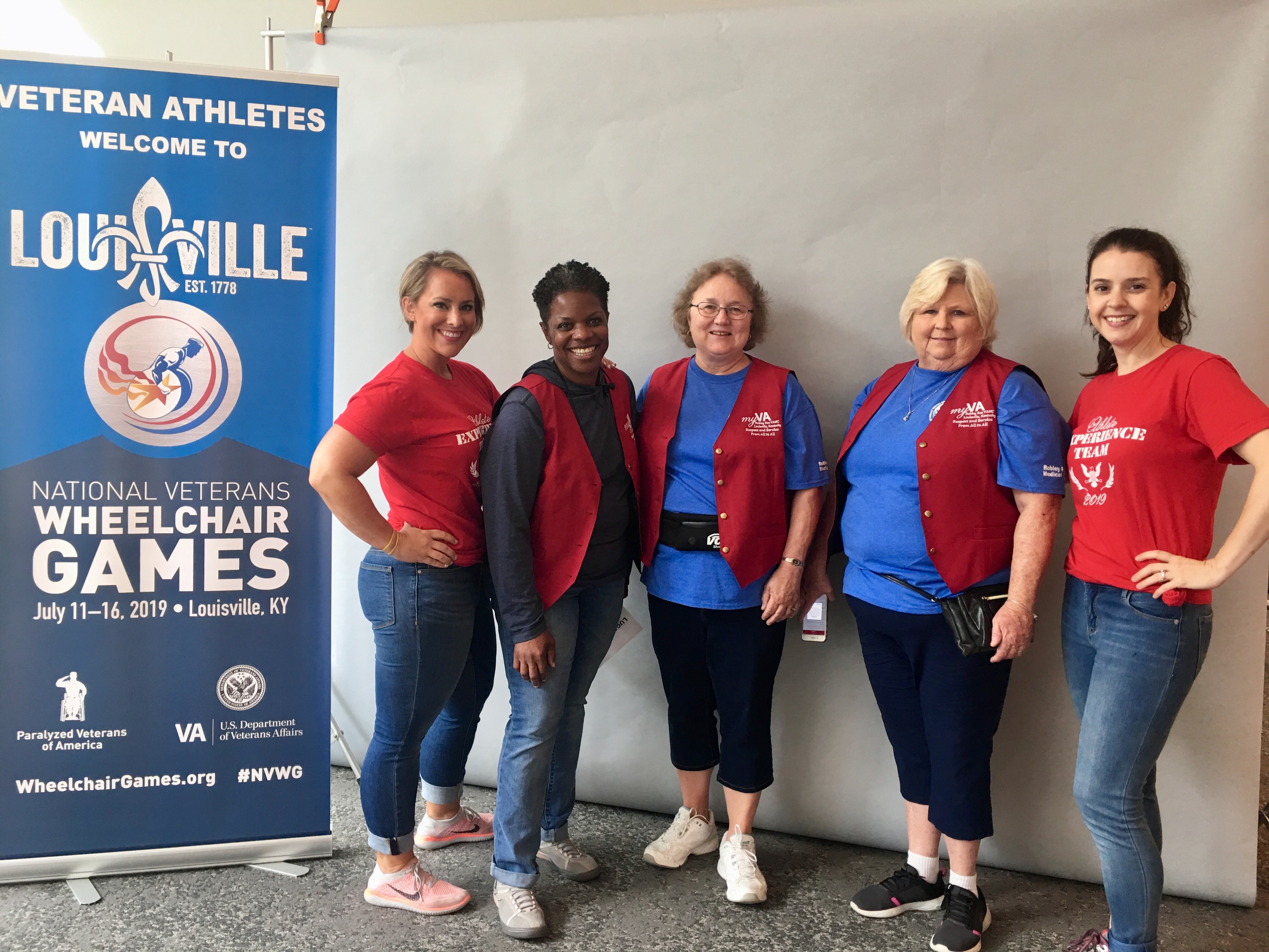 Some of the Red Coat Ambassadors and Athlete Experience Team from the Robley Rex VA that assisted Veterans and their families at the wheelchair games.