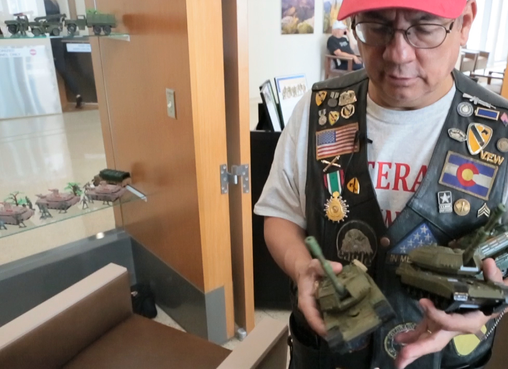 Collecting figurines has helped Stanley Vigil battle PTSD.