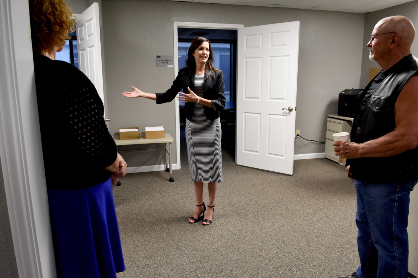Dr. Jennifer Adams, VA North Texas psychologist, shows a room during the grand opening.