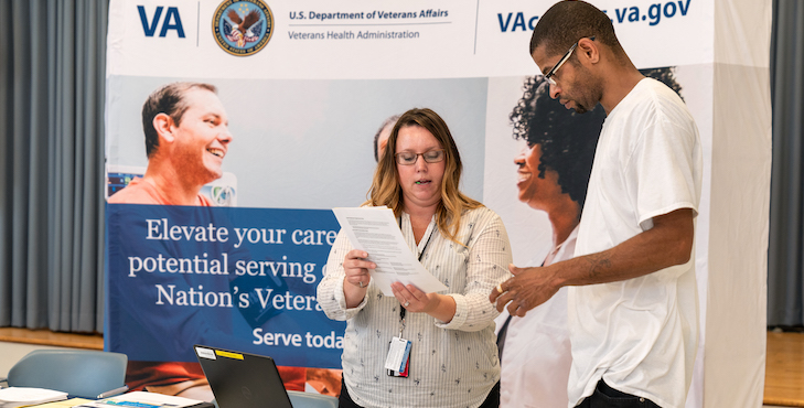 VA employees consult with applicants for VA healthcare jobs.