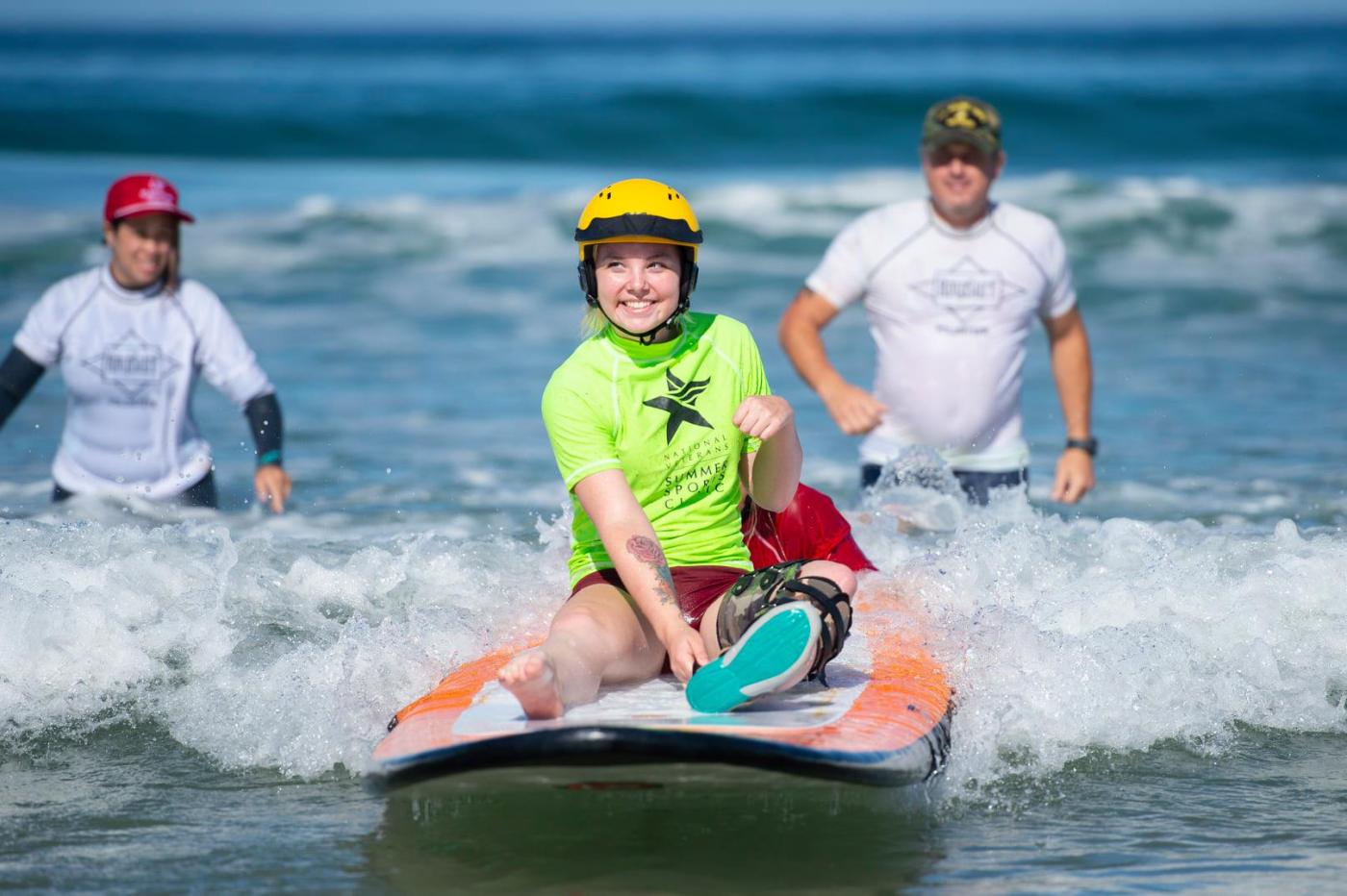 Olivia Nord surfs at the Summer Sports Clinic in San Diego.