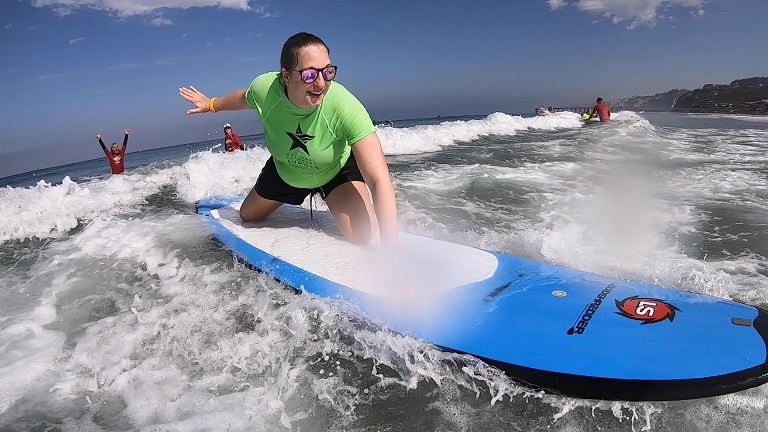 Blind, amputee and other Veterans learn firsthand about the healing waters of the San Diego surf at VA's Summer Sports Clinic.