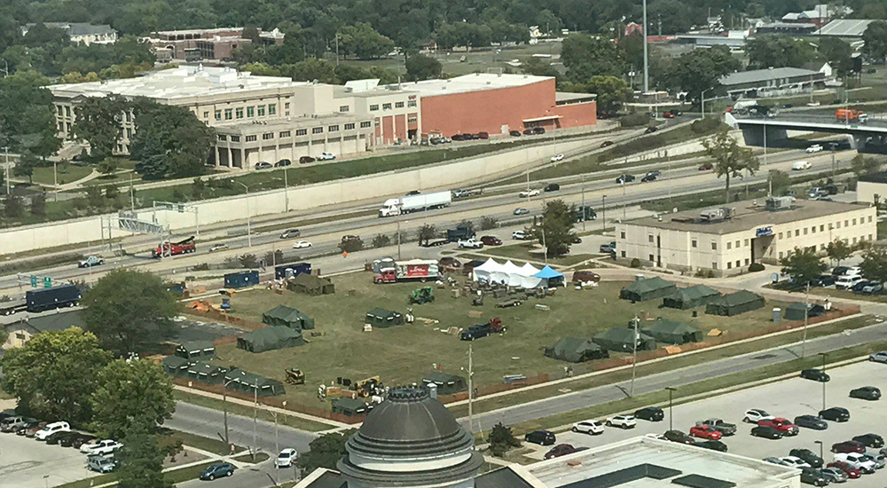 Aerial view of full city block with Stand Down tents serving homeless Veterans and others