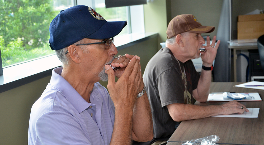 Playing harmonica is therapy for Veterans with COPD