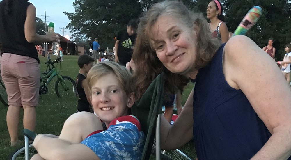 Mary Julius, pictured above with her son, is Program Quality Manager, Diabetes Self- Management Education and Support at the Northeast Ohio VA Health Care System