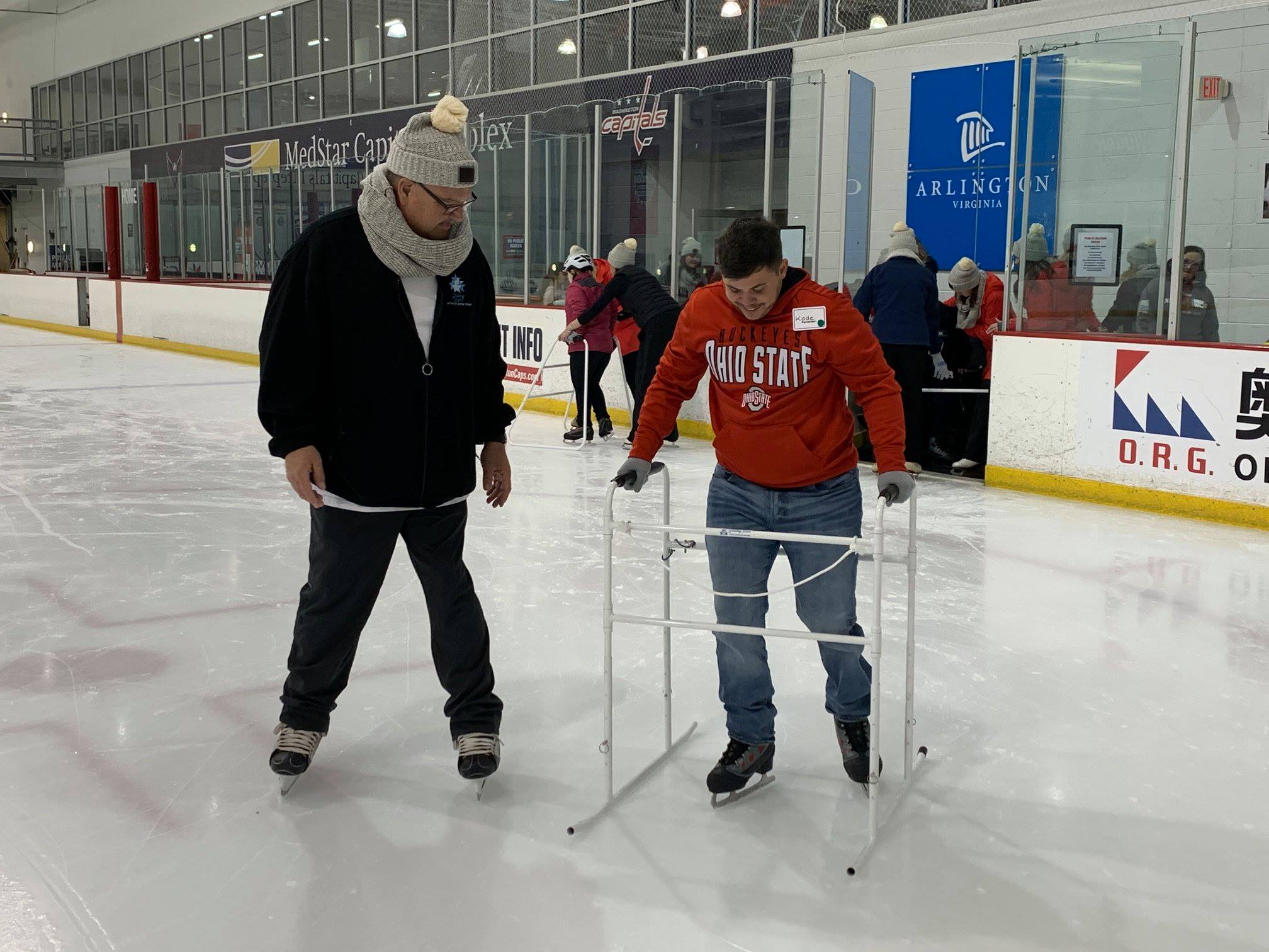 A Veteran learns to skate at the MedStar Ice Complex.