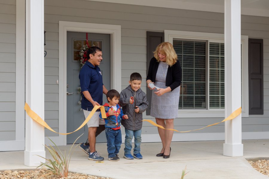 Vincente Ramirez and his sons at the ribbon cutting ceremony where his family was given a new, adapted home courtesy of the non-profit Homes For Our Troops.