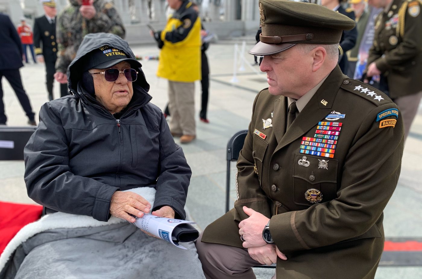 World War II Army Air Forces Veteran Constantine Rizopoulos, 91, talks to Army Gen. Mark Milley, chairman of the Joint Chiefs of Staff, at the Battle of Iwo Jima 75th Anniversary Commemoration Feb. 19 at the National World War II Memorial in Washington, D.C.