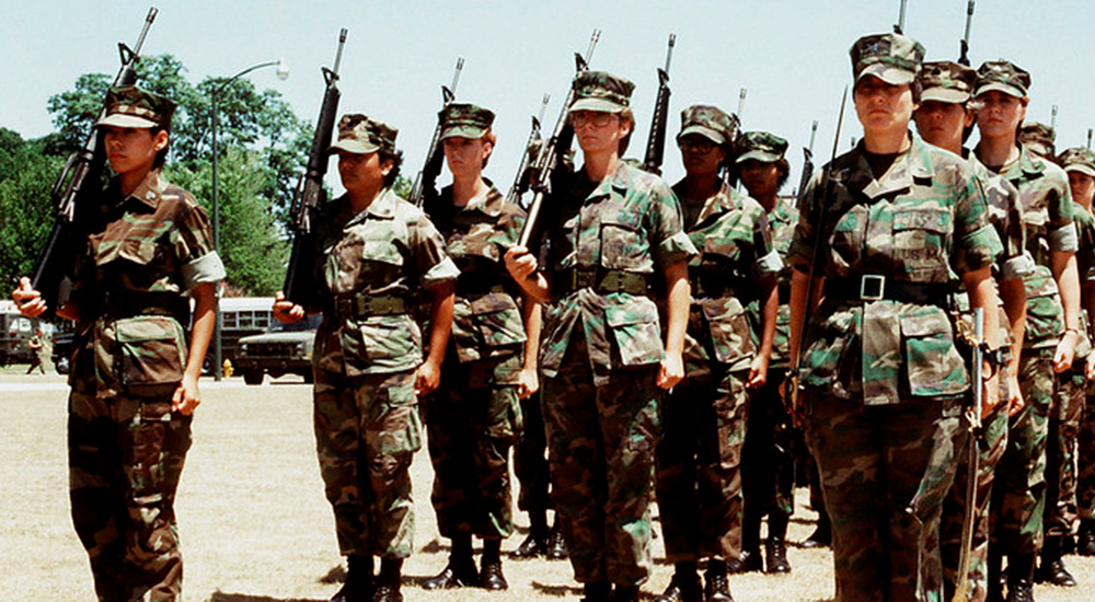 Female Marine Corps platoon stand at attention