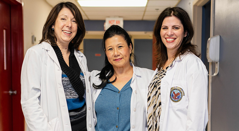 Three women medical clinicians who work with telehealth