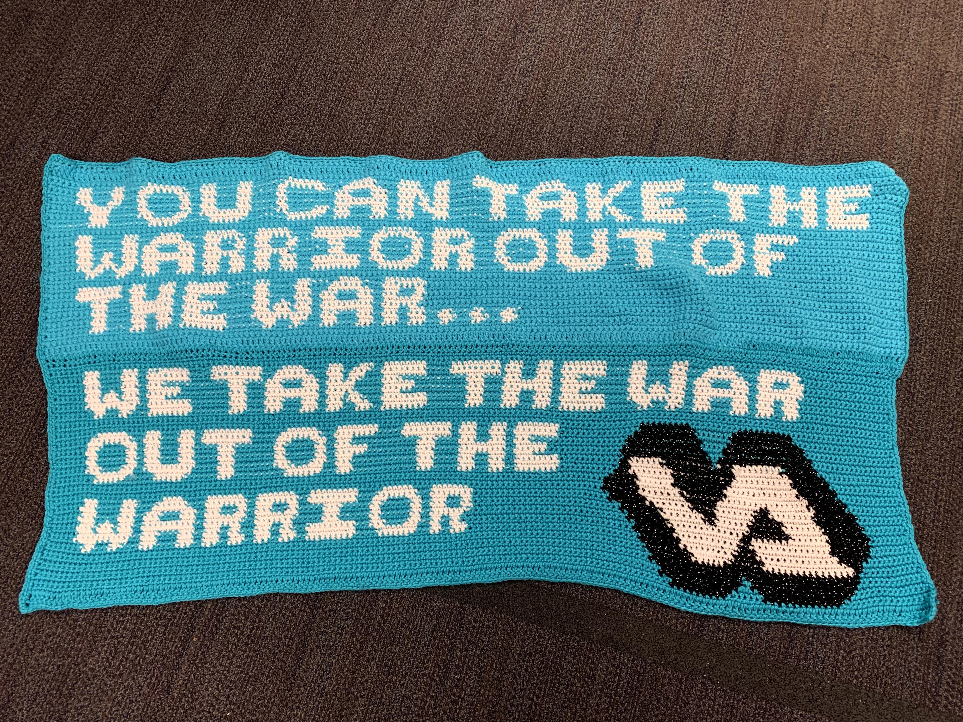 Banner with words "You can take the warrior out of the war...we take the war out of the warrior" with the VA logo.