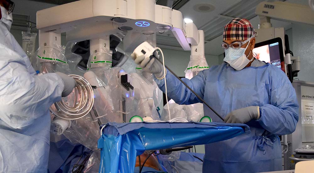 Nurse in operating room prepares equipment