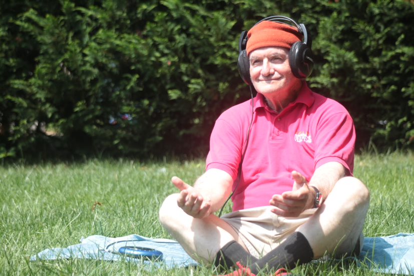 Marty Sigel, a 77-year-old Navy Veteran, tries out some meditation on a July day in Baltimore.