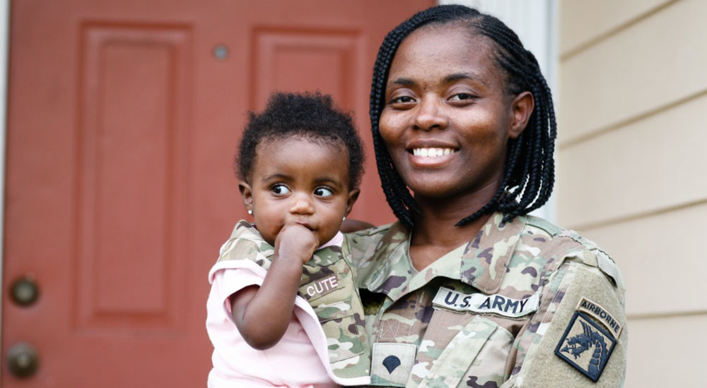 Army servicewoman with baby