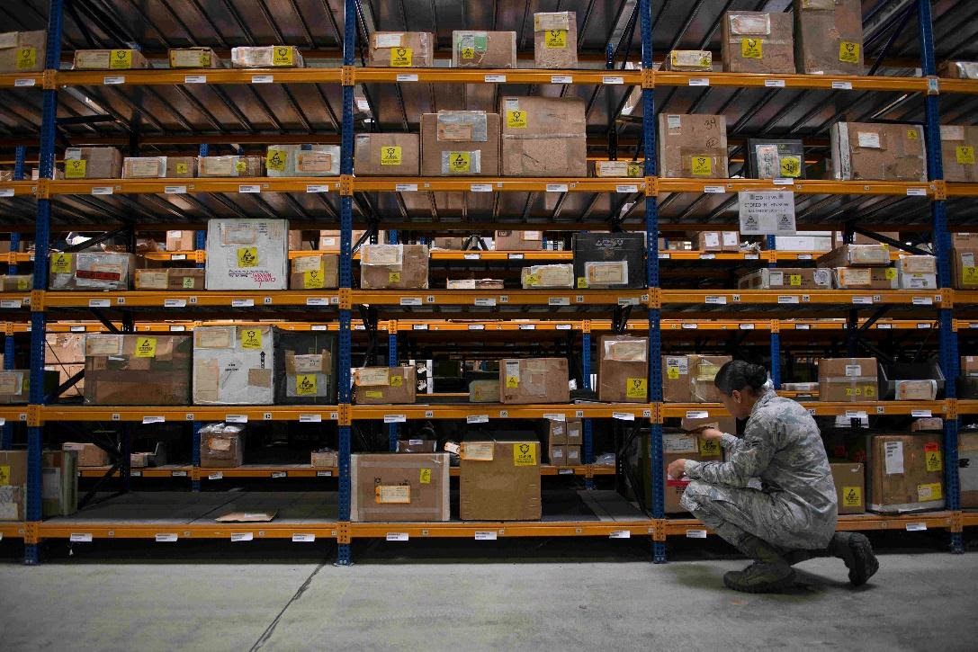 Airman inspecting inventory