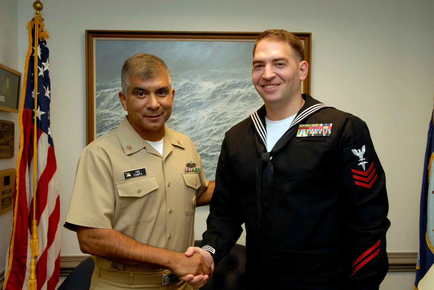 Navy Hospital Corpsman Lee Becker (right) with Master Chief Petty Officer of the Navy Joe Campa at the Pentagon in 2007.